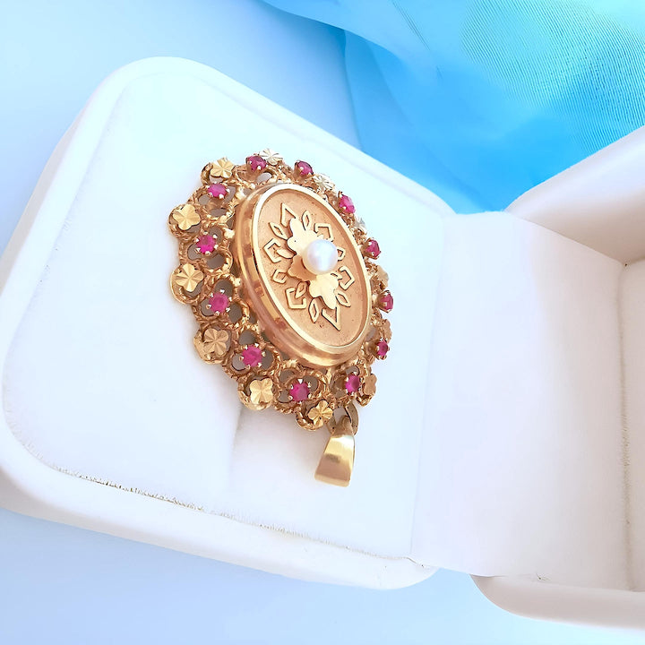 photo Bijou de luxe d occasion – Pendentif ancien or rose et rubis