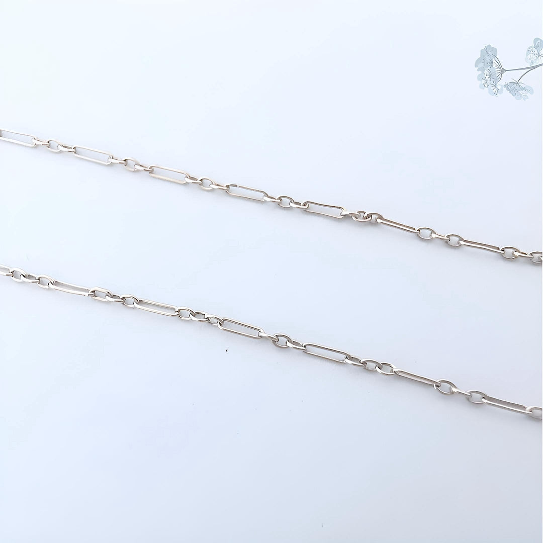 Détail chaîne maille figaro or 18K — collier Art Nouveau perles fines