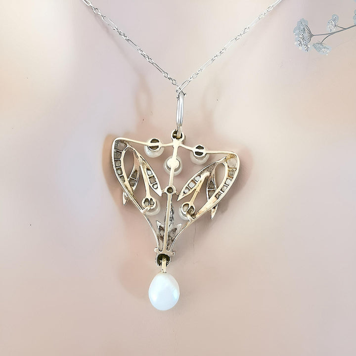 Envers du collier Art Nouveau — joaillerie perles fines or 18K, poinçon tête d'aigle