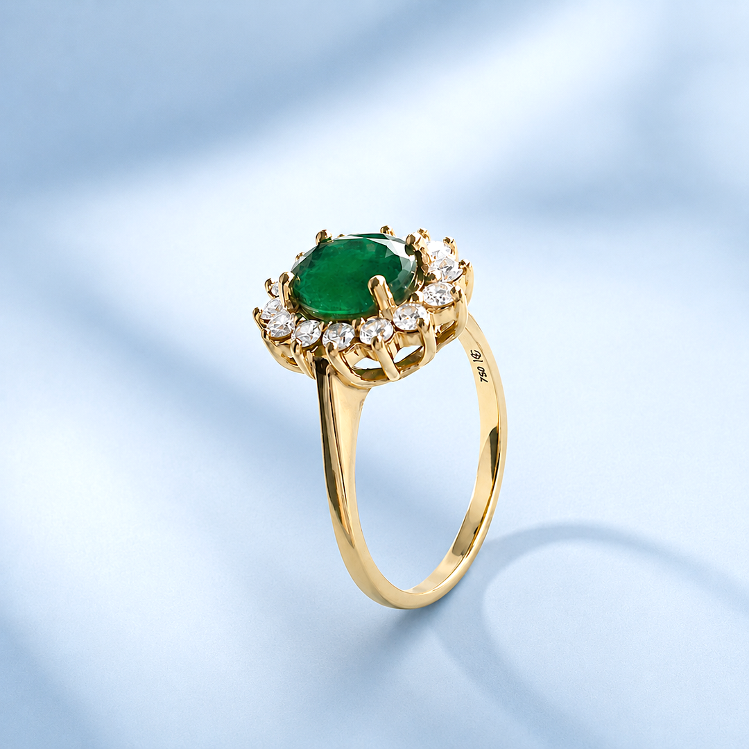 Bague de joaillerie marguerite, émeraude facettée et diamants sertis griffes, bijou d'occasion