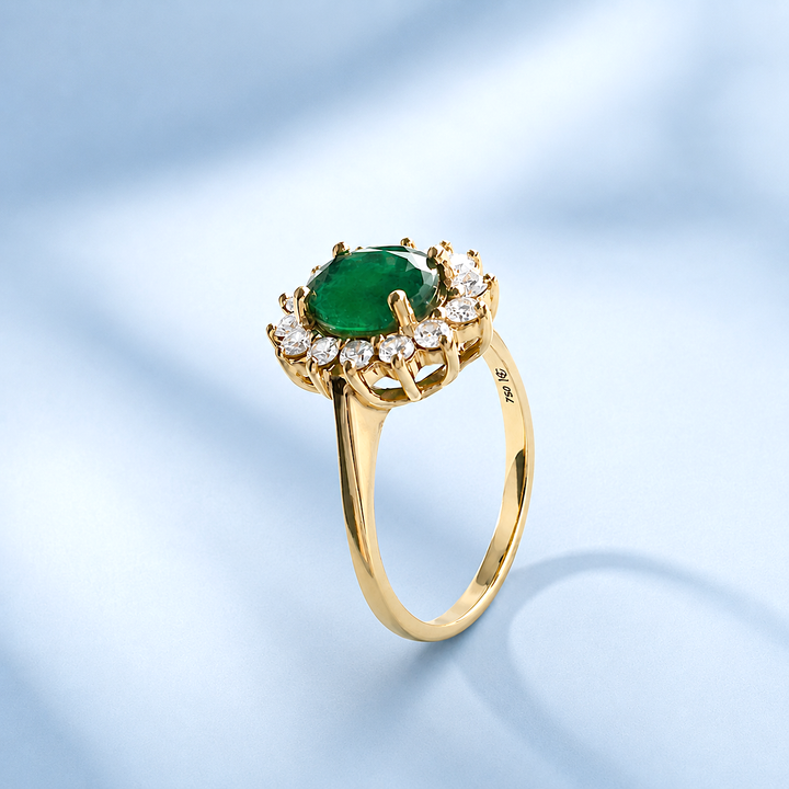 Bague de joaillerie marguerite, émeraude facettée et diamants sertis griffes, bijou d'occasion