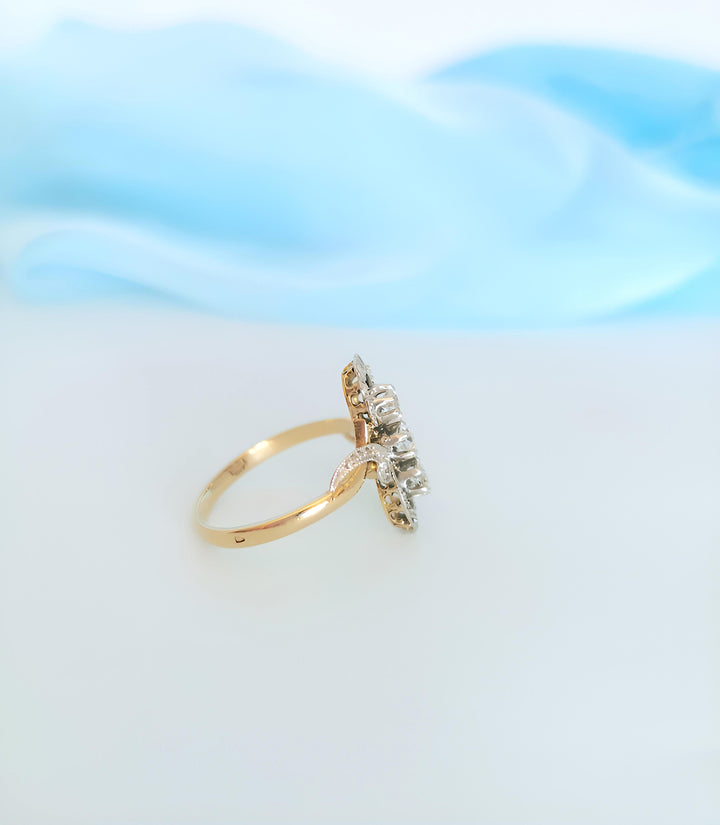 photo de la monture bague ancienne joaillerie française diamants volutes arabesques or et platine