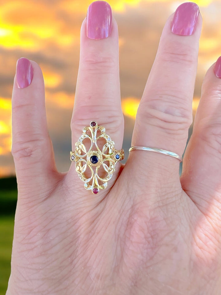 bague de seconde main rubis diamants saphirs or 18K