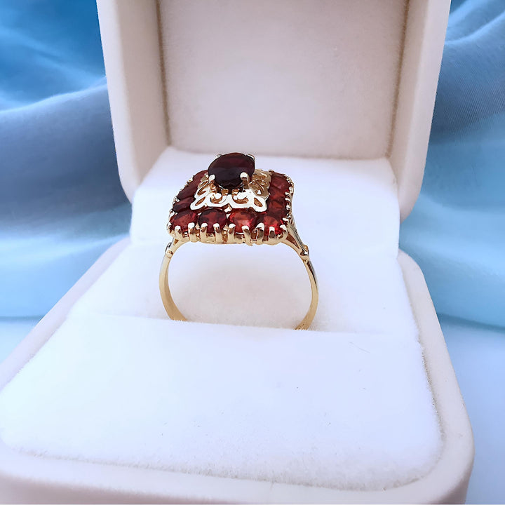 photo droite bague femme ajourée grenats