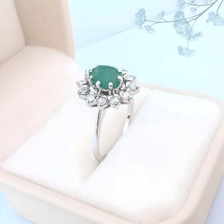 photo droite boutique valordiams bague occasion marguerite emeraude diamants or 18 carats