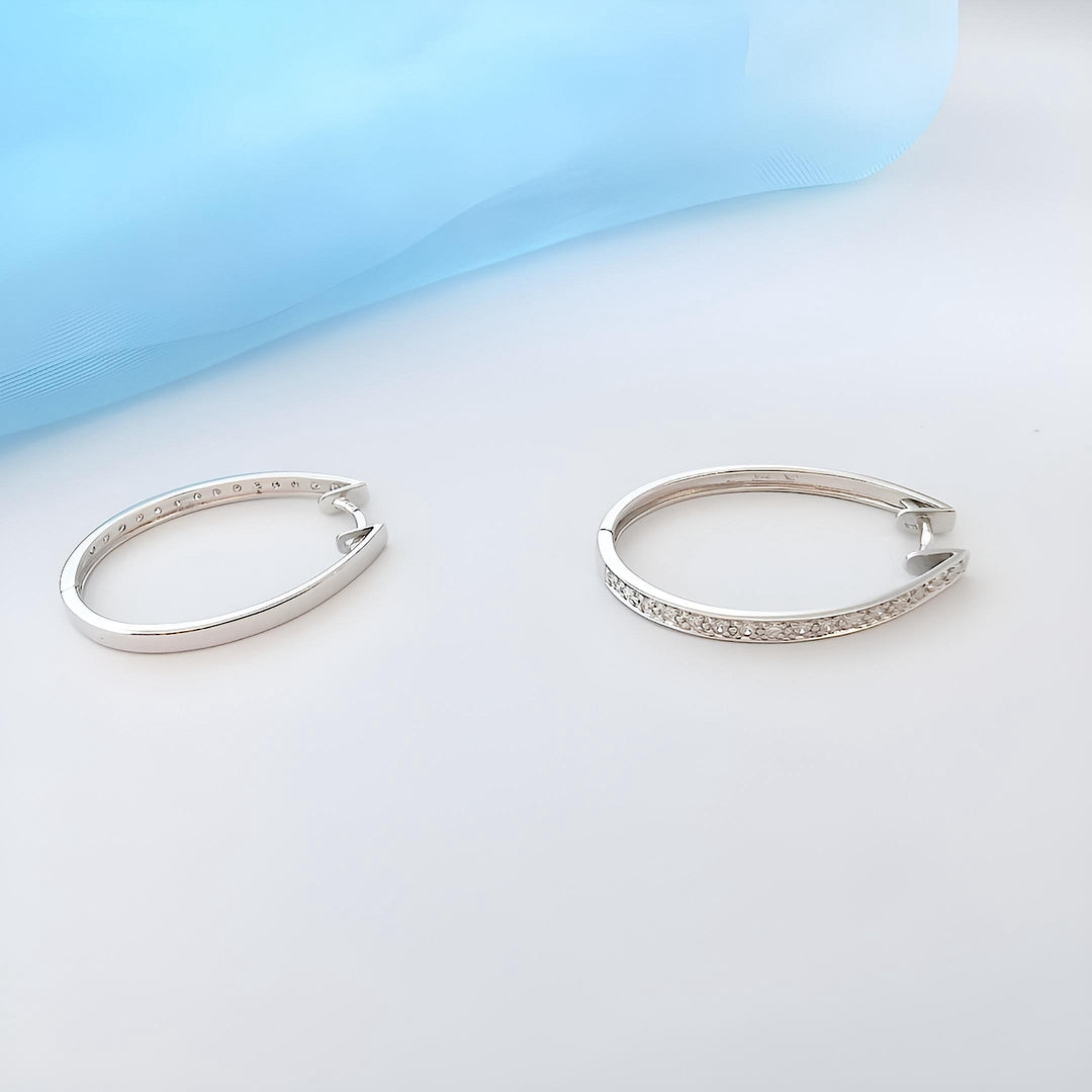 photo détaillée bijoux occasion creoles diamants or 18K