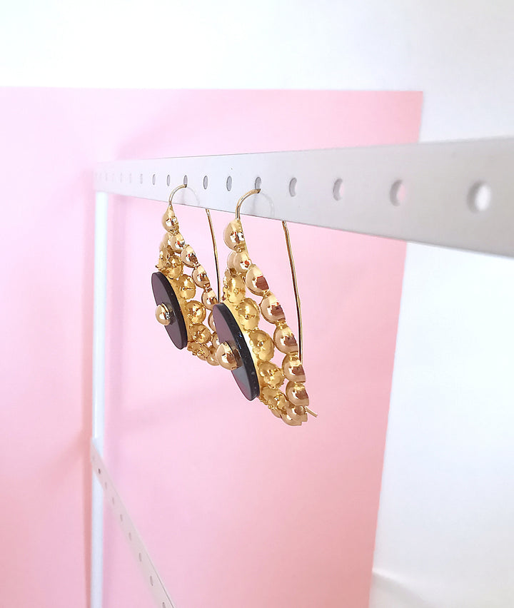 photo en biais boucles d'oreilles ancienne 1940-1950 or jaune 18 carats