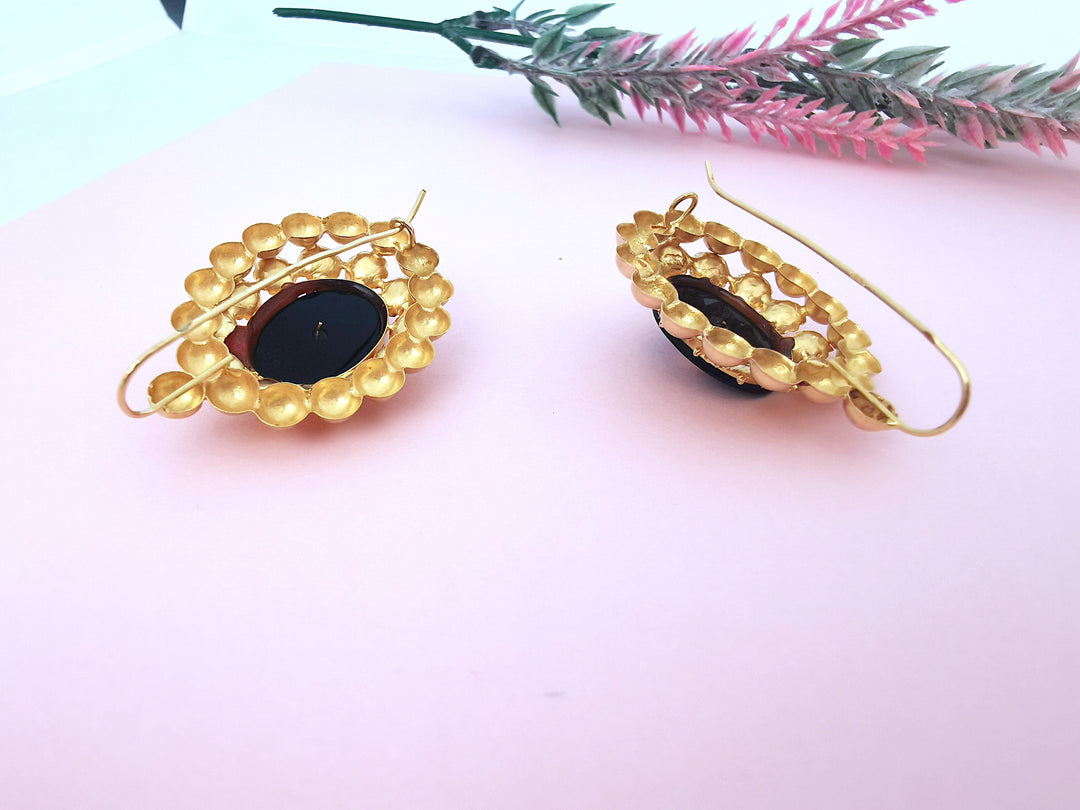 photo détaillée boucles d'oreilles anciennes pour femmes