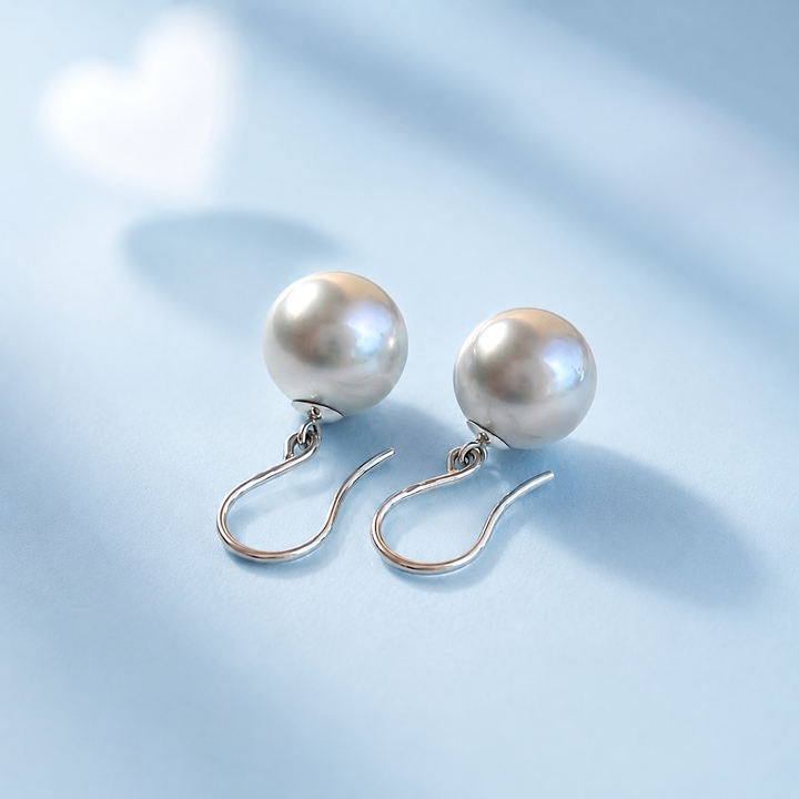 gros plan boucles d'oreilles perles tahiti or 18k valordiams