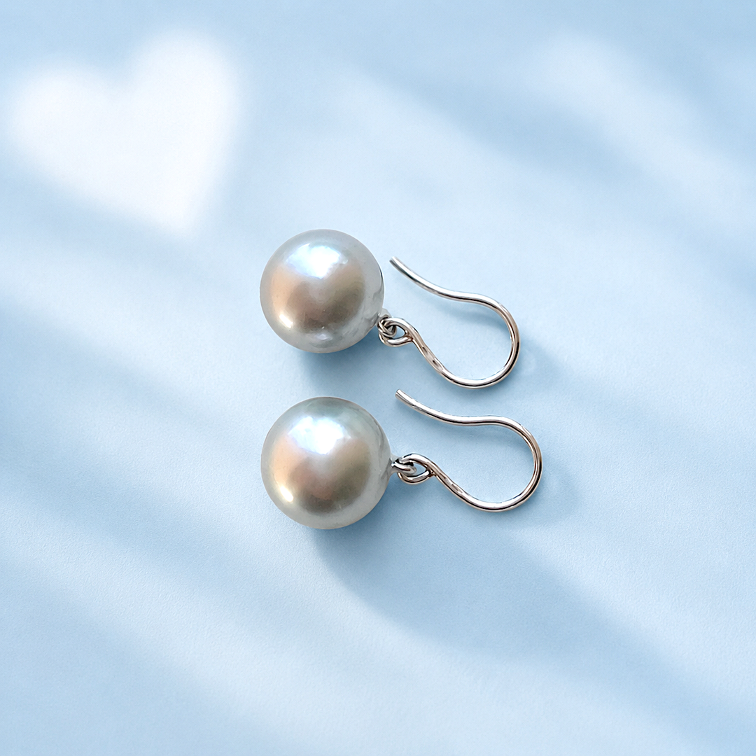 vue laterale boucles d'oreilles luxe seconde main valordiams