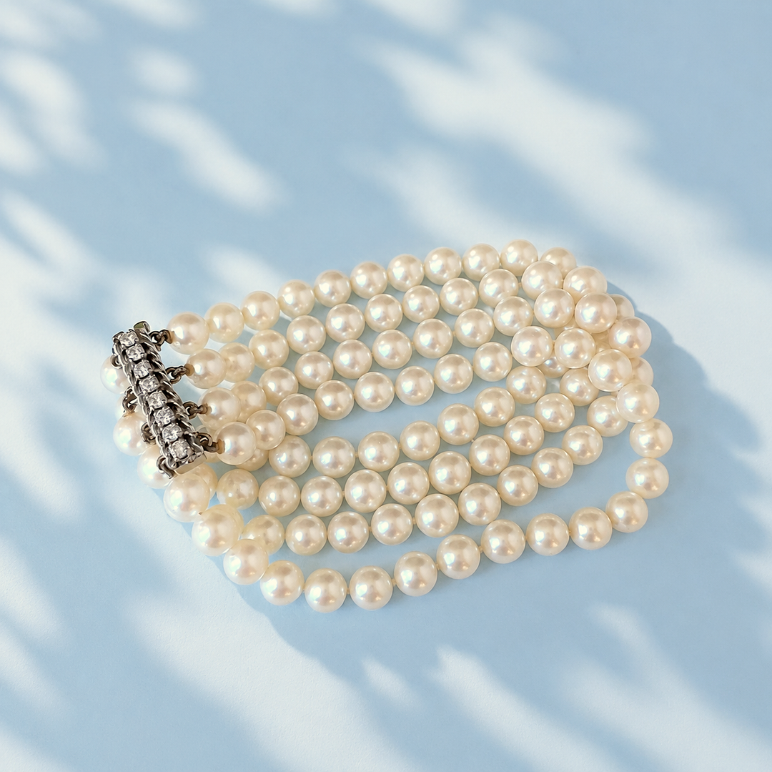 Bracelet perles de culture et diamants brillants or gris 18K, joaillerie française 1960 — Valordiams