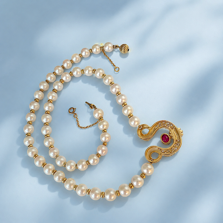 Collier pendentif perles de culture – rubis, diamants, or 750, poinçon tête d'aigle