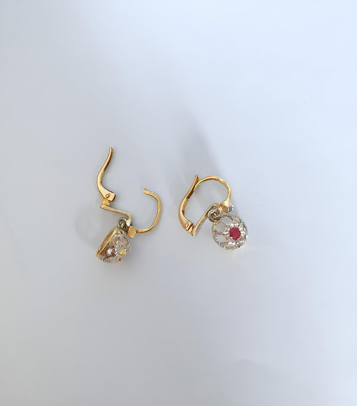 photo fermoirs joaillerie circulaire dormeuses rubis diamants