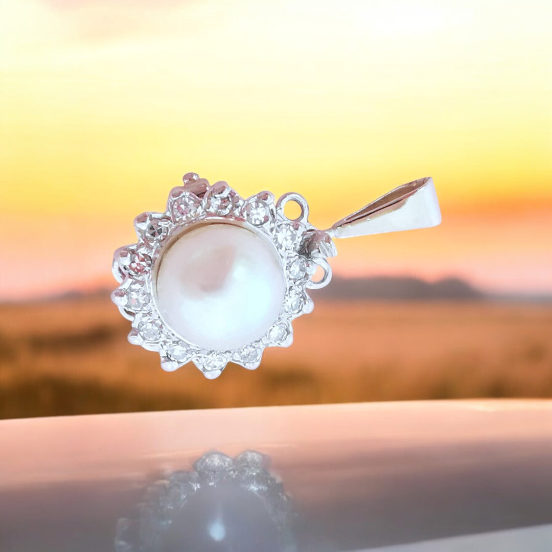 joaillerie circulaire pendentif perle de culture diamants