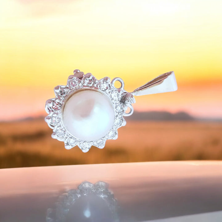 joaillerie circulaire pendentif perle de culture diamants