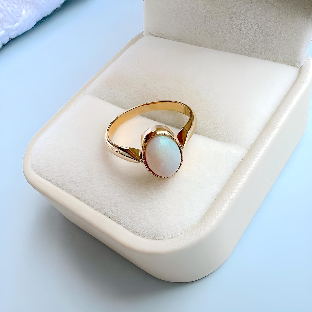 photos mises joaillerie de seconde main opale or jaune 18 carats