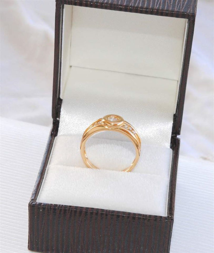BAGUE EN OR JAUNE 18 K ( 750 ) / DIAMANTS