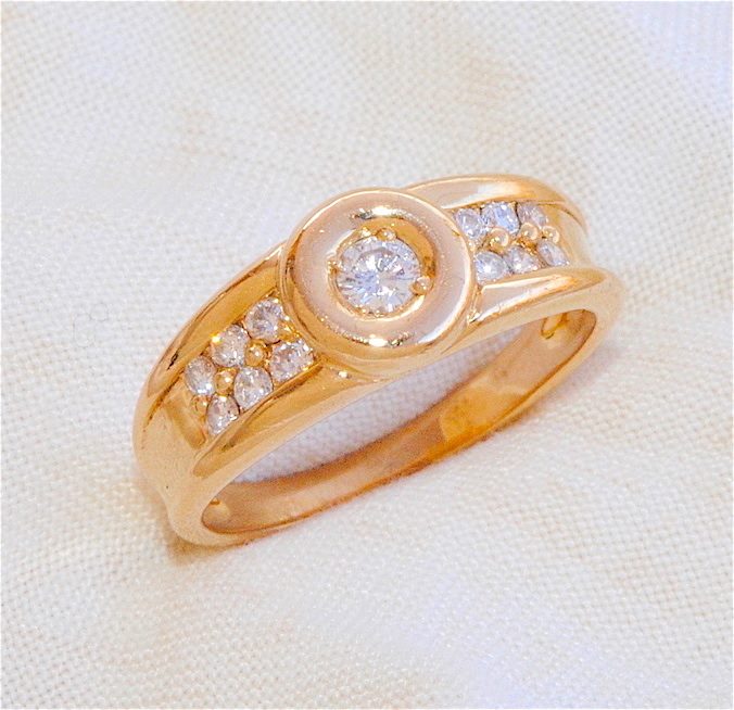 BAGUE EN OR JAUNE 18 K ( 750 ) / DIAMANTS