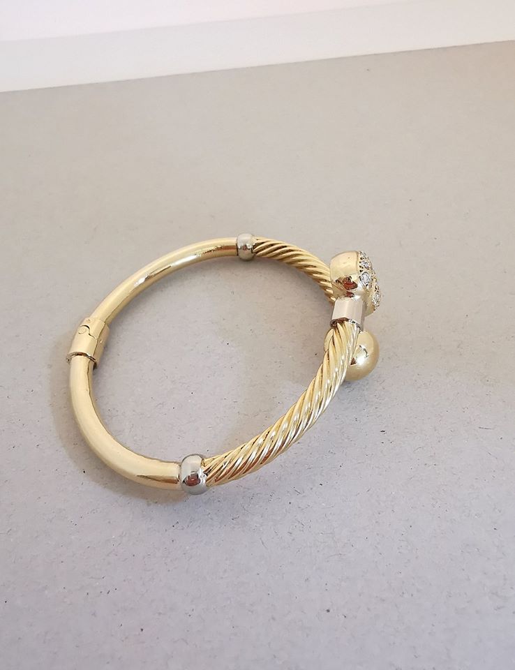 Bracelet torsadé / Rigide / Ouvert / Or 18 K / 18,11 gr / 750 / 18 carats