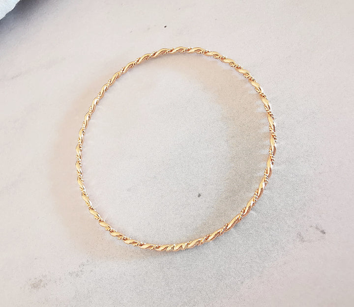 Bracelet Jonc rigide torsadé / 8,50 gr / Or Jaune 18 K / (750°/°°) / 18 carats