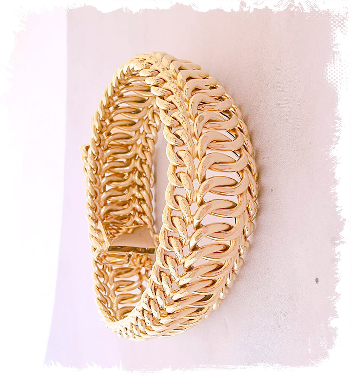 Bracelet Ruban / Gourmette / Maille entrelacée / Or 18 K / 26,38 gr / Or 18 carats / (750°/°°)