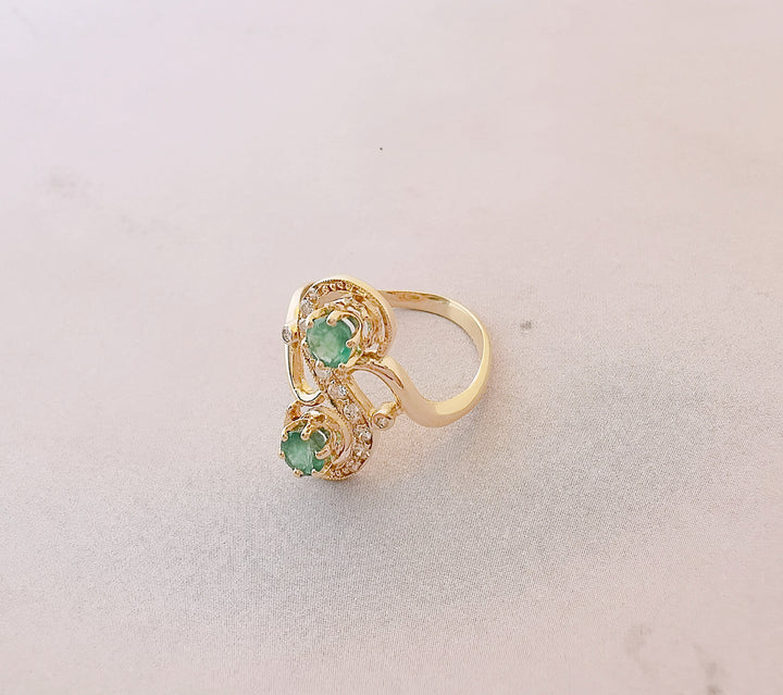 Bague " Toi et Moi " / Emeraudes / Diamants / Or Jaune 18 K / 18 carats / (750°/°°)