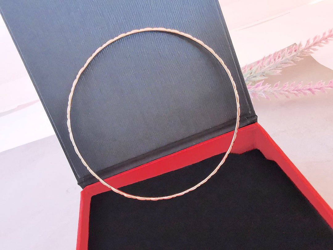 Bracelet Jonc ciselé / 5,49 gr / Or Rose 18 K / (750°/°°) / 18 carats