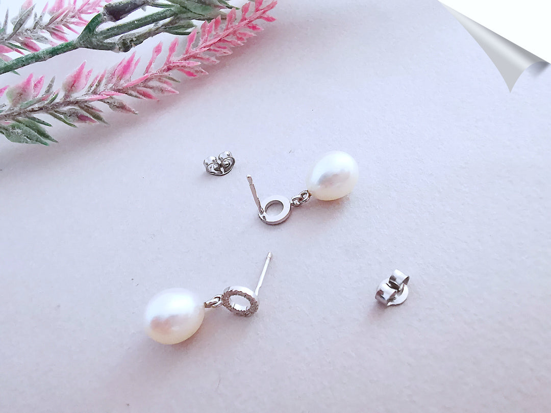 Boucles d'oreilles pendantes Perles de culture / Diamants / Or Blanc 18 K / 18 carats / (750°/°°)